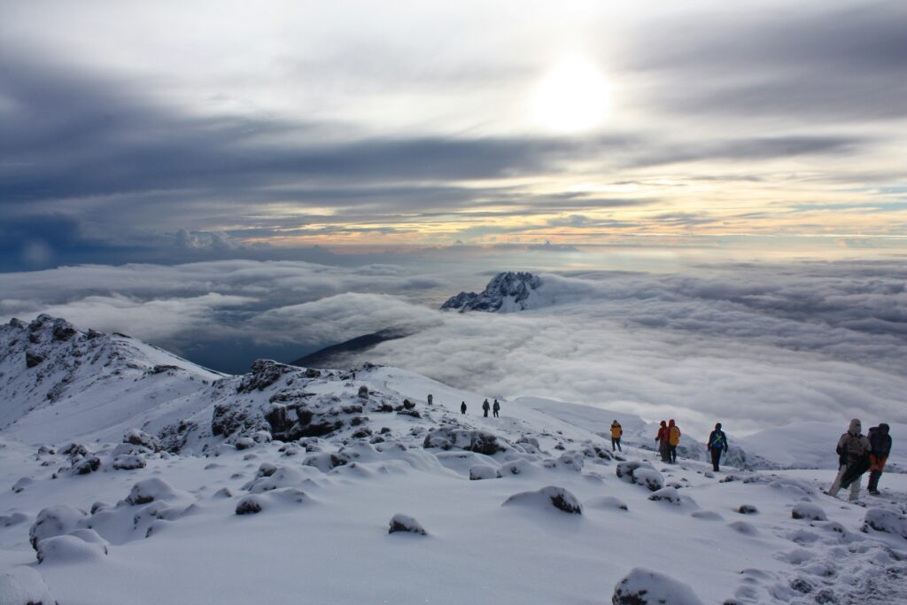 Conquer Africa's highest peak! Expert-backed Mount Kilimanjaro climbing strategies, route comparisons, and altitude survival tip